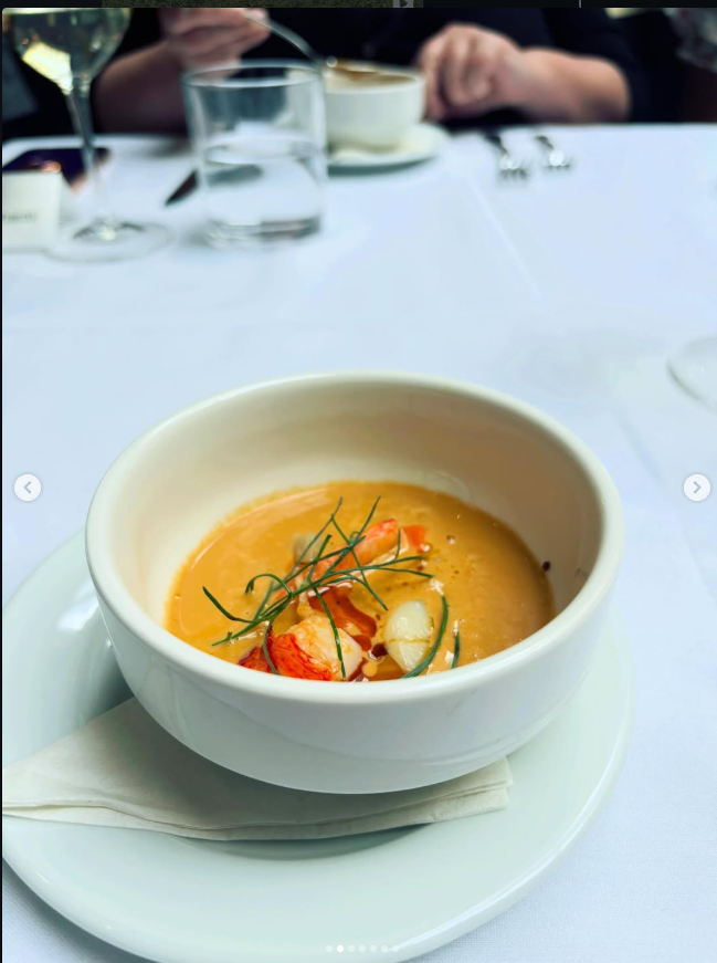 Illustrative soup in a white bowl