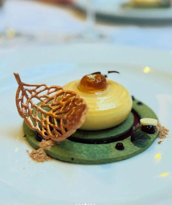 Illustrative sculptural dessert with a delicate lattice detail